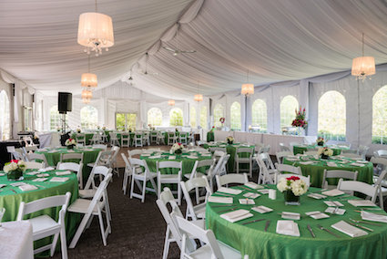 outdoor tent with tables and chairs, festive party